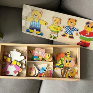 Obdržená dřevěná sada na převlékání od zákazníka M***e.