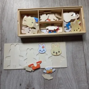 Obdržená dřevěná sada puzzle na převlékání od zákazníka T***e.