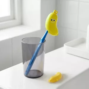 Banánový cestovní obal na zubní kartáček a pastu pro děti